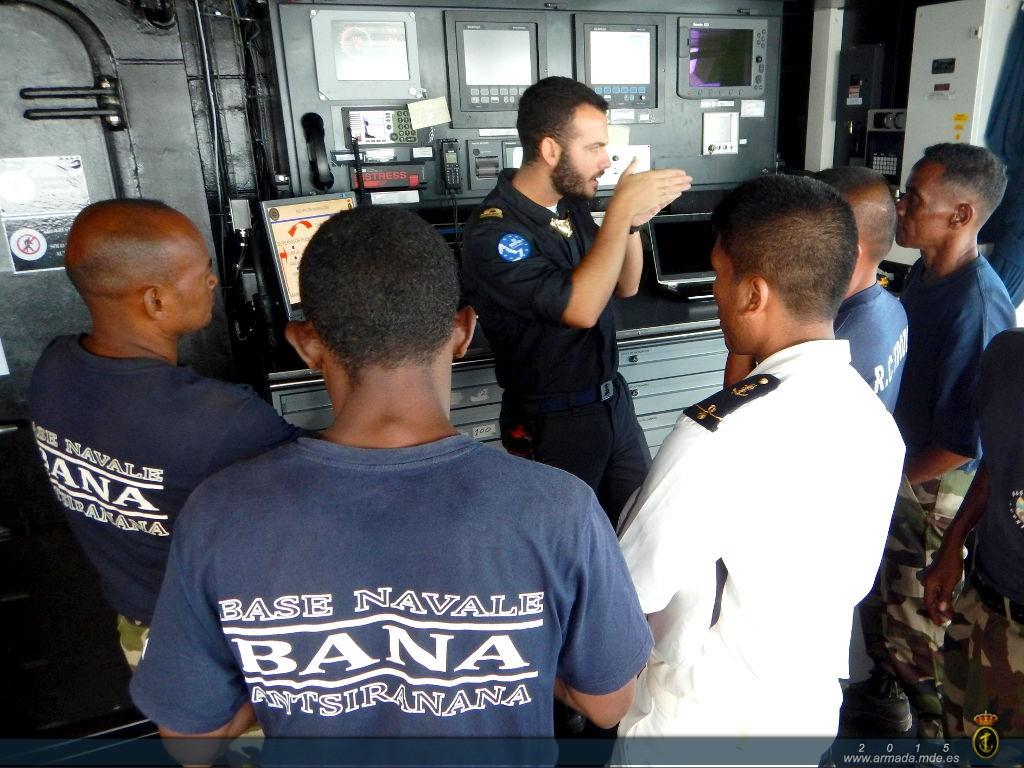 A Spanish crew member briefing his Madagascan counterparts