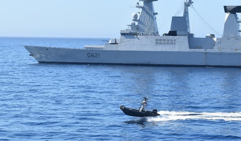 An unmanned surface vehicle passing alongside the French frigate ‘Chevalier Paul’.